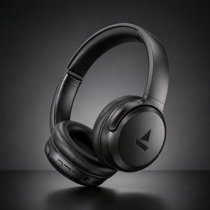 Black wireless over-ear Bluetooth headphones with cushioned earcups and matte finish on dark premium studio background