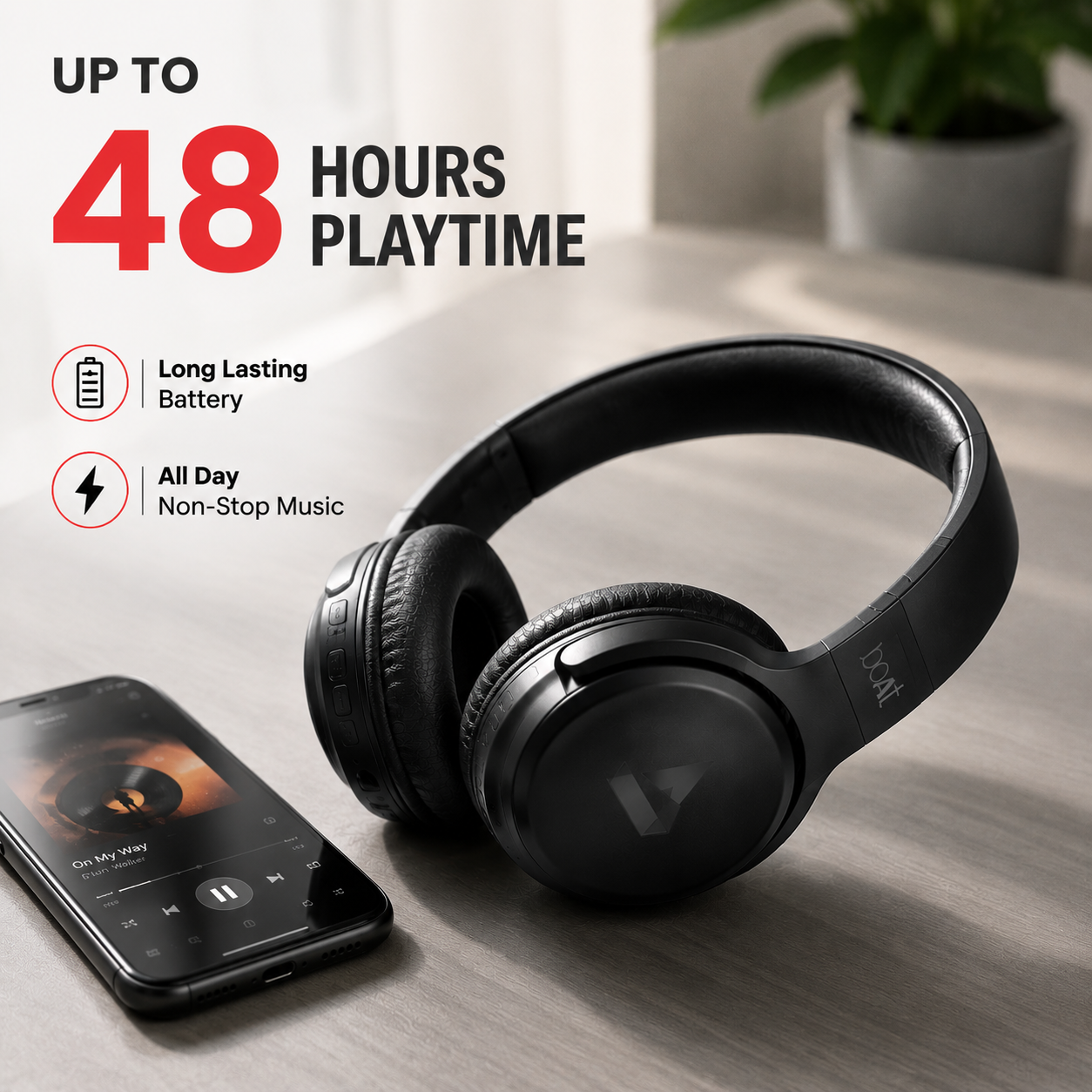 Bluetooth headphones with up to 48 hours playback shown beside smartphone in modern lifestyle setup