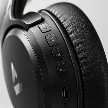 Close-up of wireless headphone control buttons and Type-C charging port with premium matte finish
